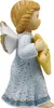 A ceramic figurine of an angel holding a star. Produktbild-Vorschau