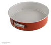 A round springform cake pan with a red exterior and a white interior, shown from a slightly elevated side angle against a white background. Produktbild-Vorschau
