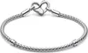 A silver Pandora bracelet with a heart-shaped clasp is displayed against a white background. Náhled obrázku produktu
