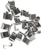A pile of small, shiny metal clips scattered on a white background. Náhľad obrázku produktu