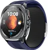 A close-up, angled view of a blue and gray smartwatch with a dark background. Náhled obrázku produktu