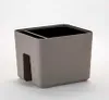 A single beige planter with two compartments against a white background. Náhled obrázku produktu