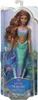A doll in its packaging, designed to look like a mermaid. Voir les images du produit