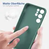 A hand is touching the inside of a green phone case, highlighting its matte surface and soft grip. Produktbild-Vorschau