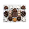 A clear, top-down view of a box of assorted Christmas cookies. Náhled obrázku produktu