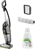 A vacuum cleaner and its accessories are displayed against a white background. Voir les images du produit