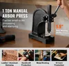 A manual arbor press is shown on a wooden table, with various applications illustrated below. Náhled obrázku produktu