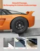 An orange sports car is shown driving over a modular garage floor mat system. Three smaller inset images show close-ups of the mat system's features. Voir les images du produit