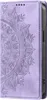 A close-up view of a purple phone case with a mandala design. Produktbild-Vorschau