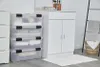 A stack of clear storage boxes filled with folded towels and linens, placed next to a white bathroom cabinet with a ladder and basket in the background. Produktbild-Vorschau