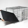 A black wire dog crate with a black plastic tray being inserted into the bottom. Anteprima dell’immagine prodotto