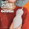 A person holding a unicorn-shaped water bottle. Anteprima dell’immagine prodotto