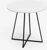 A round white table with black metal legs on a white background. Anteprima dell’immagine prodotto