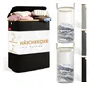 A product image showcasing a black laundry basket with a wooden lid, filled with clothes. It is presented alongside other laundry baskets of different colors and styles. Náhled obrázku produktu