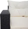 Close-up of a woven armrest and cushions of an outdoor furniture set. Anteprima dell’immagine prodotto