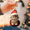 A hand holding a Christmas ornament of a cat wearing a Santa hat. Produktbild-Vorschau
