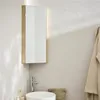A corner bathroom cabinet with a mirror above a sink and faucet. Voir les images du produit