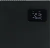 A close-up of a black electric heater with a digital display. Náhled obrázku produktu
