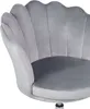 Close-up of a gray velvet office chair with a shell-shaped back. Náhled obrázku produktu