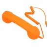 An orange retro telephone handset with a coiled cord and a 3.5mm jack connector is shown against a white background. Náhled obrázku produktu