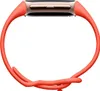 A Fitbit Charge 6 with a coral band is shown against a white background. Náhled obrázku produktu