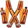A pair of orange Husqvarna suspenders with black trim and branding, laid out in an X shape against a white background. Náhľad obrázku produktu