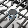 A close-up view of a gas stove burner with a blue flame. Náhľad obrázku produktu