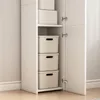 The interior of a white cabinet with shelves holding storage boxes. Podgląd zdjęcia produktu