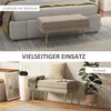 A collage showing a beige upholstered bench with gold legs in two different settings: at the foot of a bed and in a hallway-like setting. Anteprima dell’immagine prodotto