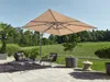 An outdoor patio scene with a large cantilever umbrella, seating, and landscaping. Produktbild-Vorschau