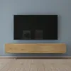 A modern living room with a wall-mounted TV and a wooden media console. Produktbild-Vorschau
