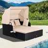 A double lounger with a canopy is set up on a patio next to a swimming pool, with a scenic mountain landscape in the background. Voir les images du produit