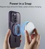 Hands holding a purple iPhone case and a silver wireless charger, demonstrating magnetic alignment for charging. Anteprima dell’immagine prodotto