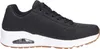 A side view of a black SKECHERS UNO STAND ON AIR men's sports shoe with a white sole and a brown outsole. Anteprima dell’immagine prodotto