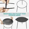 A collage of images showing the assembly and use of a cast iron grill plate with removable legs. Produktbild-Vorschau