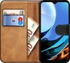 A book-style phone case with slots for cards and cash, showing a smartphone inside. Produktbild-Vorschau