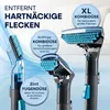 Close-up marketing image showing different cleaning attachments for a carpet cleaner. Voir les images du produit