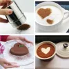 A collage of four images showing a stainless steel shaker for powders, a cup of coffee with cinnamon hearts, a heart-shaped chocolate cake, and a bowl of cocoa powder with a heart shape. Produktbild-Vorschau