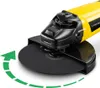 A close-up shot of a yellow and black angle grinder with a green arrow indicating rotation. Produktbild-Vorschau