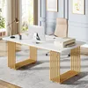 A modern white desk with gold legs in an office setting. Anteprima dell’immagine prodotto