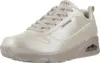 A studio shot of a single beige Skechers sneaker against a white background. Voir les images du produit