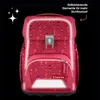 A pink backpack with reflective elements highlighted against a black background. Anteprima dell’immagine prodotto