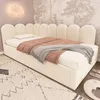 A bedroom scene with a bed, rug, and wall decor. Náhled obrázku produktu
