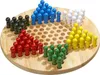 A Chinese checkers board game with colorful pieces arranged in their starting positions. Podgląd zdjęcia produktu