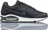 A side view of a black Nike Air Max Command leather sneaker on a white background. Voir les images du produit