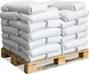 A stack of white bags on a wooden pallet. Produktbild-Vorschau