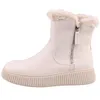A side view of a single beige boot with white fur trim. Produktbild-Vorschau