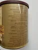 A close-up of a tin can with text and instructions. Podgląd zdjęcia produktu