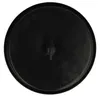 A black, circular lid or filter with a central protruding piece and some text in the upper left corner. Produktbild-Vorschau