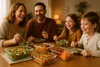 A family is enjoying a meal together, with several glass food containers filled with salads and snacks on the table. Náhľad obrázku produktu